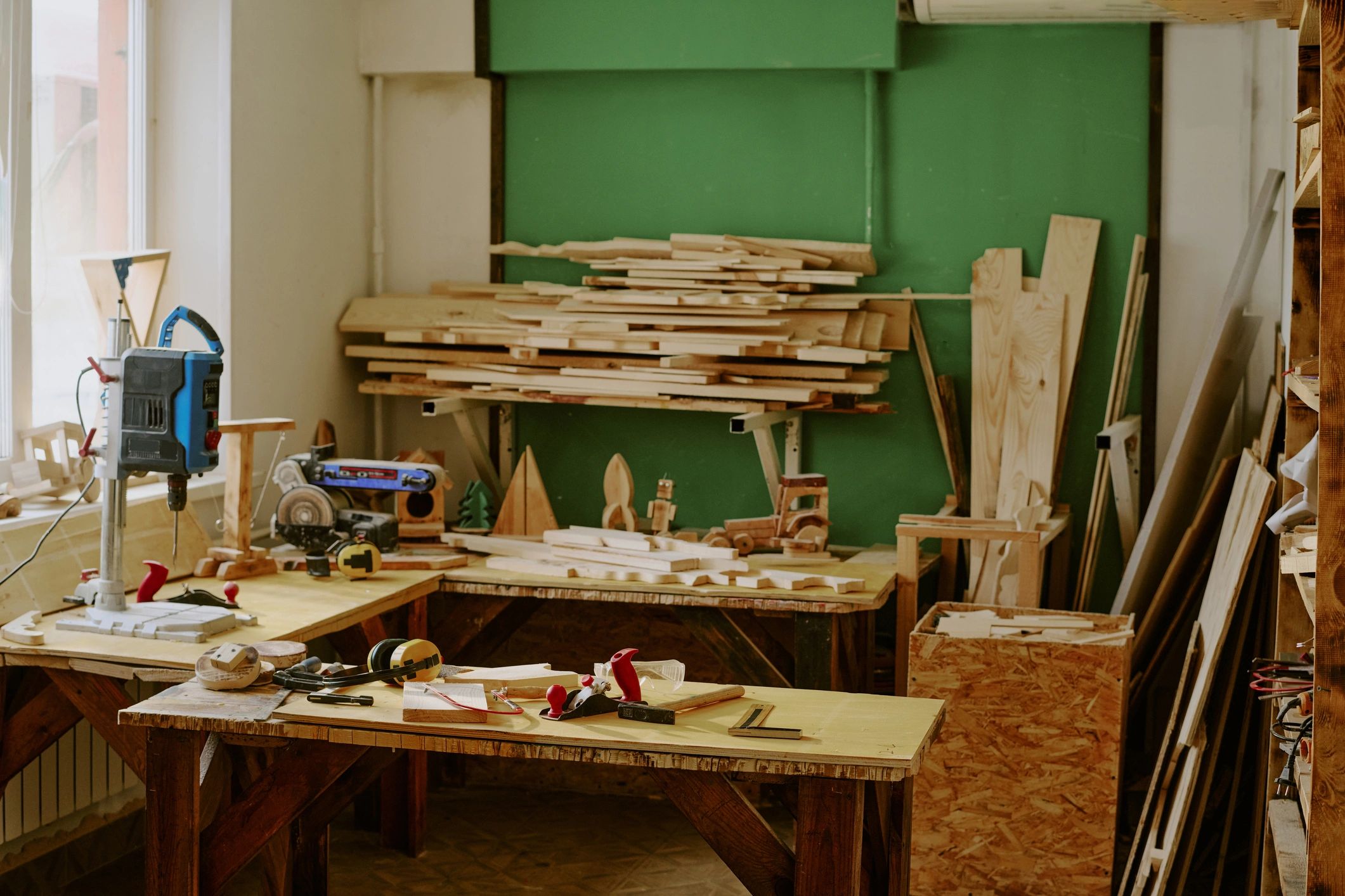 Rustic craft workspace with woodworking tools and materials